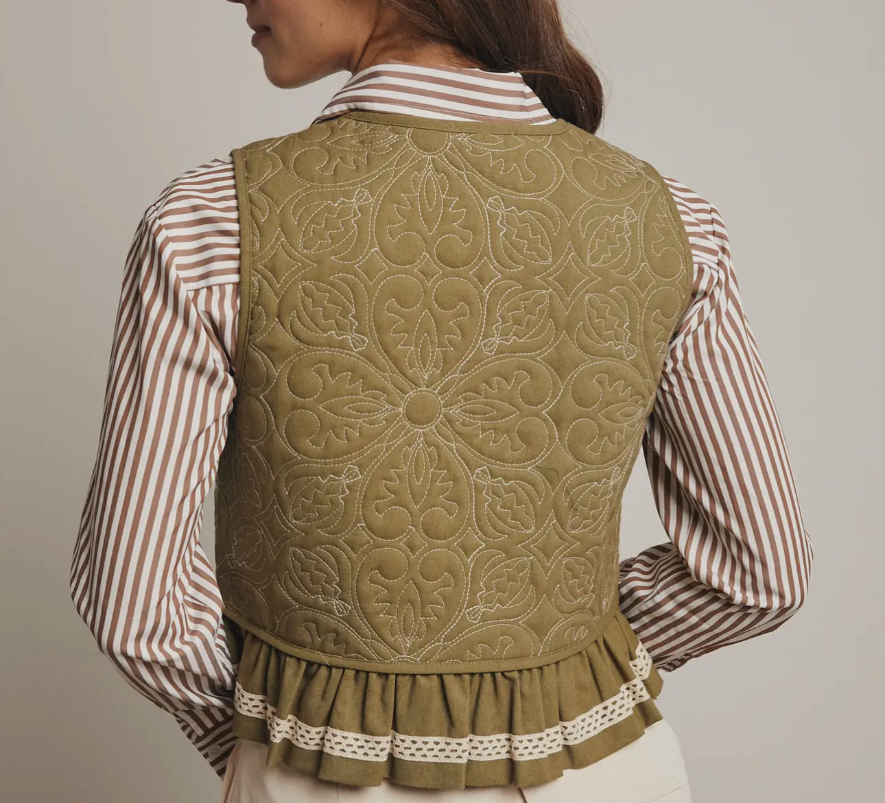 TRACKING TIME QUILTED VEST